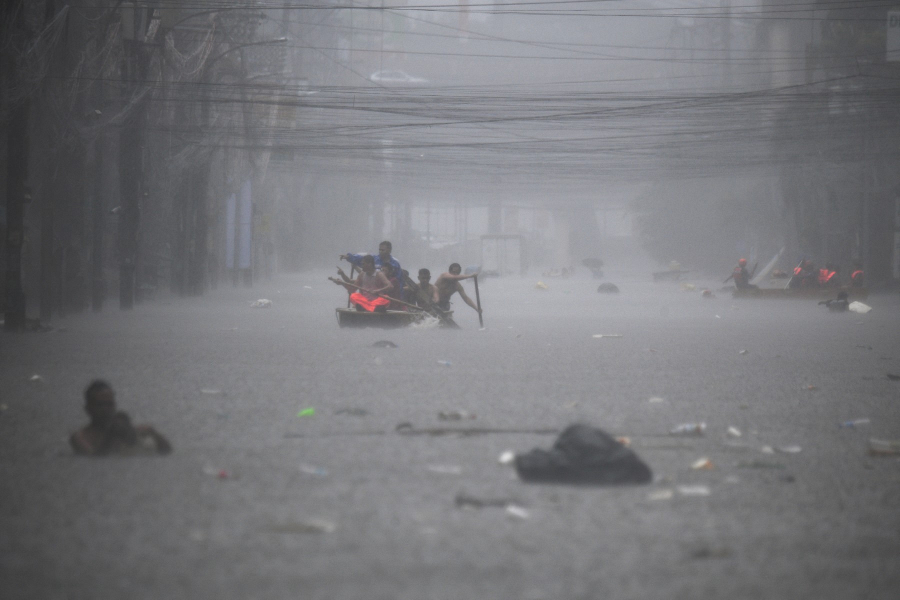 Streets Turned Into Rivers As Typhoon Gaemi Blows Past Philippines 